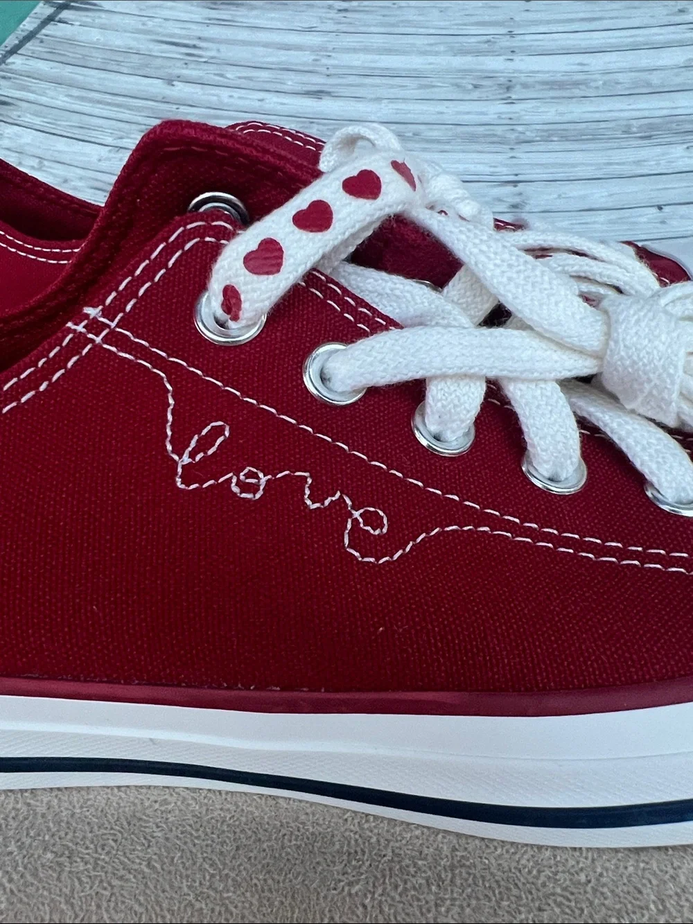Converse Women's Low Top Sneakers in Burgundy with Heart-Print Laces